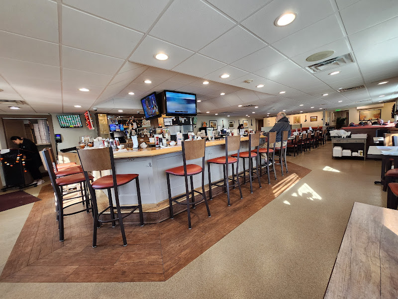 Interior of Maria's Breakfast and Lunch showing the bar area and dining room