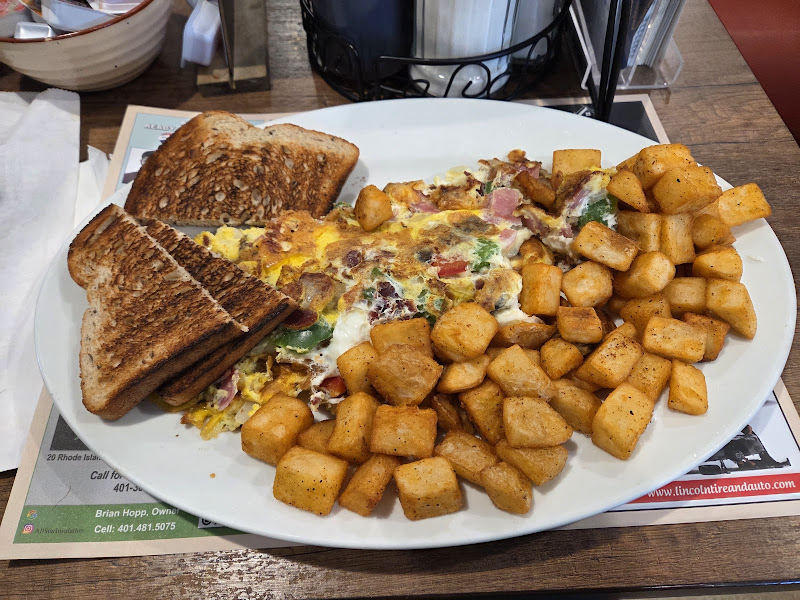 Hearty omelet with golden home fries and toast